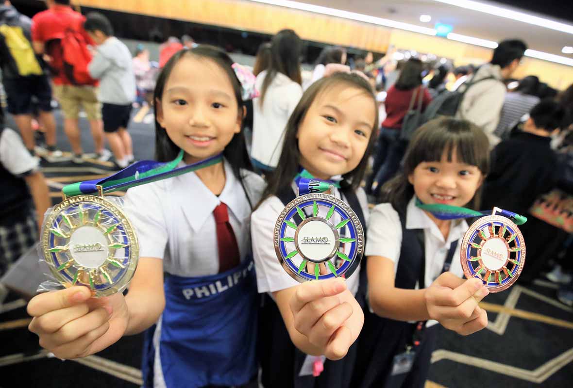 3 girls win medals after math Olympiad training in Singapore