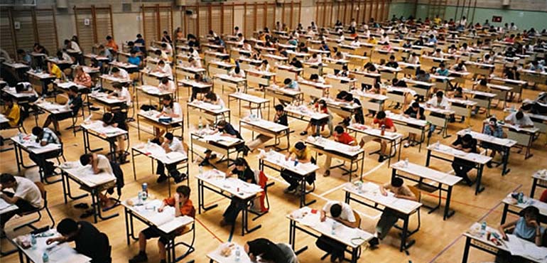 students sitting for a maths competition in the exam hall