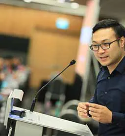Coach Leo addresses students on math olympiad training in Singapore